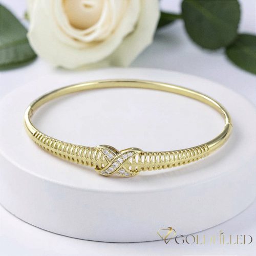 Bracciale GOLDFILLED antiallergico 7-4mm colore  (14K) diametro 60mm "apribile"